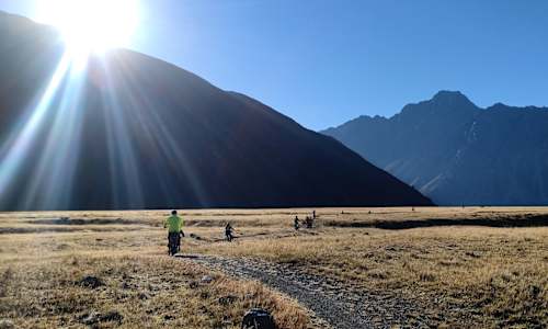 Guests cycling through Aoraki Mount Cook National Park
